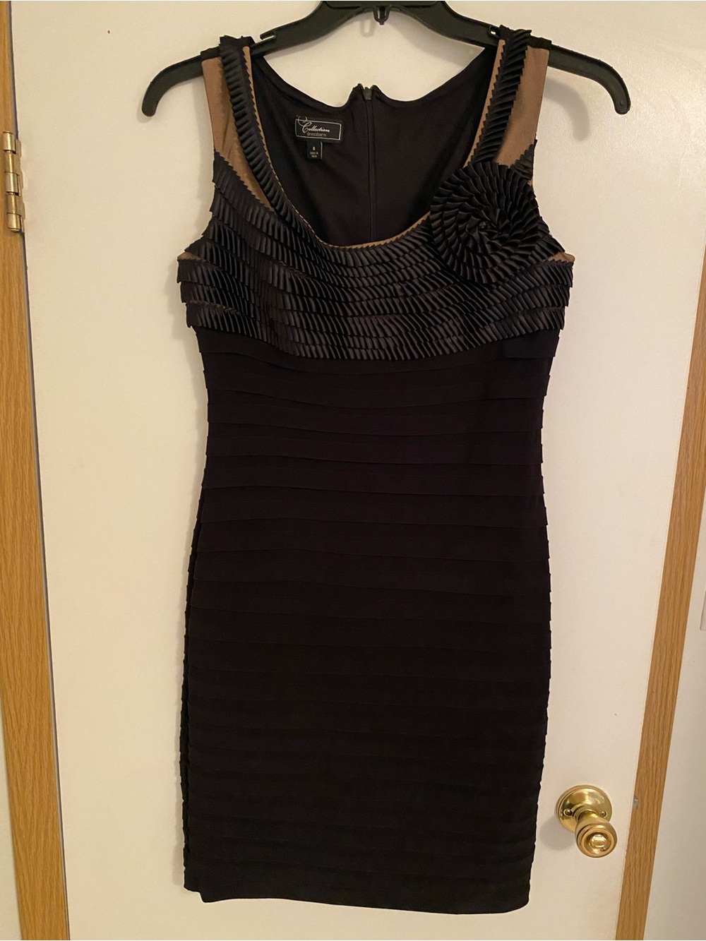 dressbarn Black Sleeveless Pleated Bodycon Dress with Rosette and Nude Trim